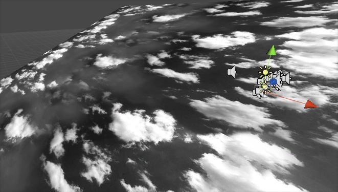 Unity editor: camera and sound gizmos hovering over a ground plane textured with a black-and-white cloud sky