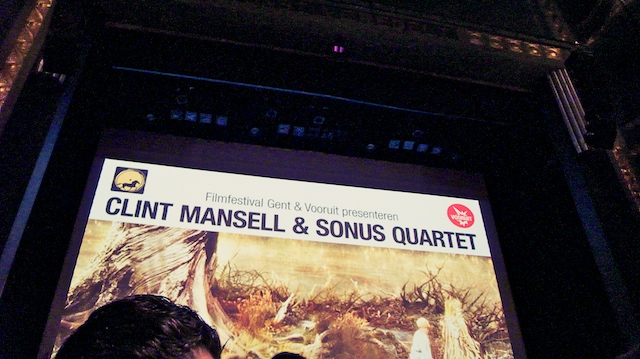 Vooruit cinema screen from the balcony: 'Filmfestival Gent & Vooruit presenteren CLINT MANSELL & SONUS QUARTET'