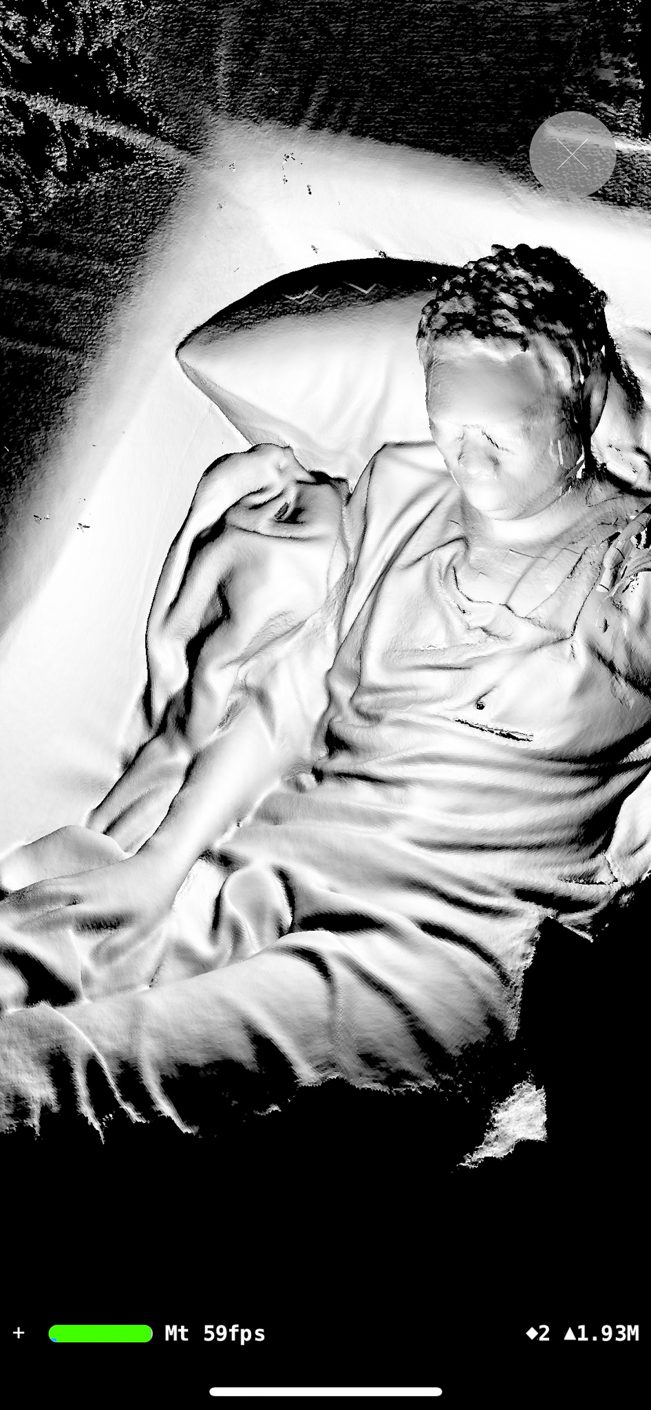 Live 3D scan of someone sprawled on the couch, rendered as white sculptural relief — 59fps, 1.93 million points and counting