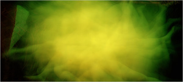 Atta Kim's long-exposure Making Love: two bodies dissolved into a single yellow-green cloud of light on darkness