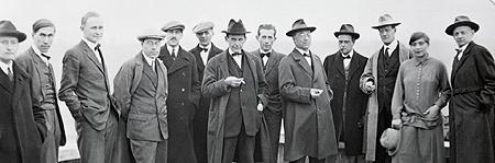 Group photograph of the Bauhaus masters in coats and hats on the Dessau roof — Gropius, Kandinsky, Klee, Moholy-Nagy among them
