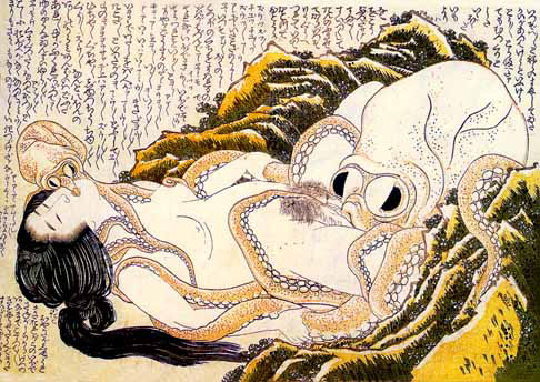 Hokusai's shunga print The Dream of the Fisherman's Wife: a woman reclining among rocks in the embrace of two octopuses, calligraphy filling the sky