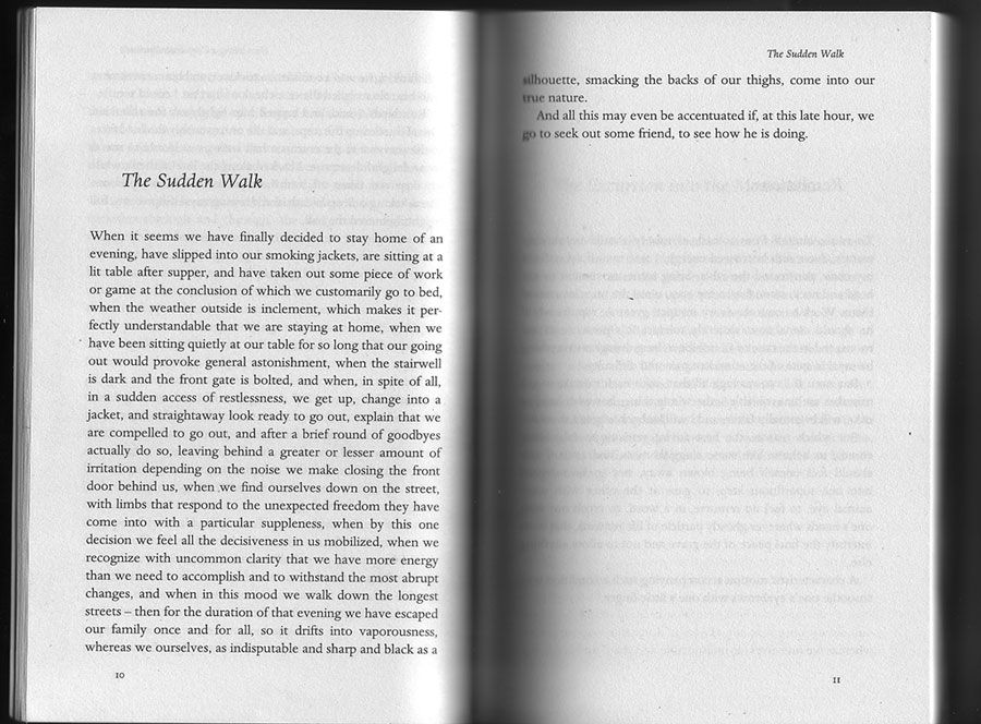 Book spread of Kafka's short prose piece The Sudden Walk, its single long sentence about abruptly leaving the house at night filling the left page