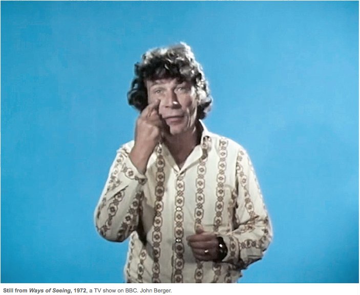 John Berger in a patterned shirt against a flat blue ground, a still from Ways of Seeing, BBC 1972