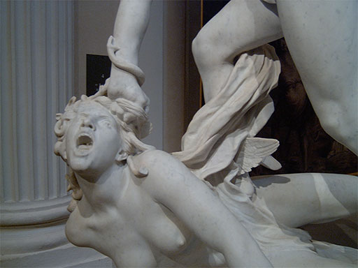 Detail of Marqueste's Perseus Slaying Medusa: the gorgon cries out, head wrenched back, small wings at her shoulder, beside a fluted column